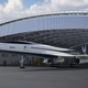 A render of a Boom supersonic aircraft in a hanger.